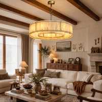Alabaster drum chandelier in a living room, full fixture with canopy