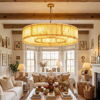 Alabaster drum chandelier in a bright living room