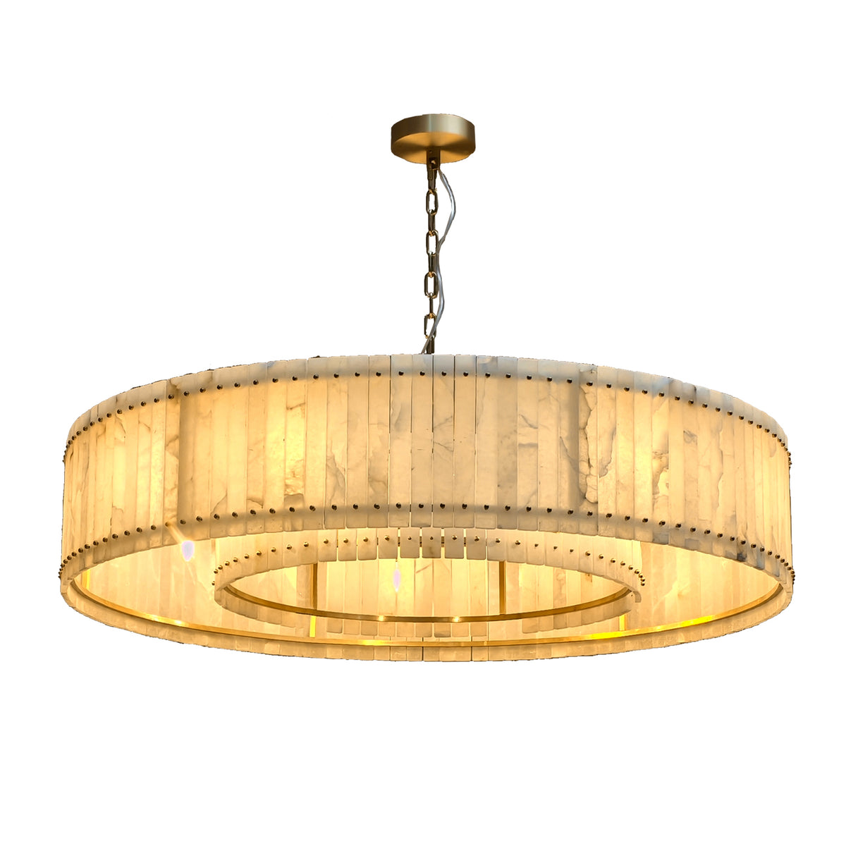 Alabaster drum chandelier with gold-tone copper frame on white background
