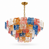 Celestine layered multicolor glass chandelier with Gold frame on white background