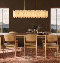 Fluted White Glass Linear Chandelier — lifestyle view 2 with fluted white glass and plated metal accents