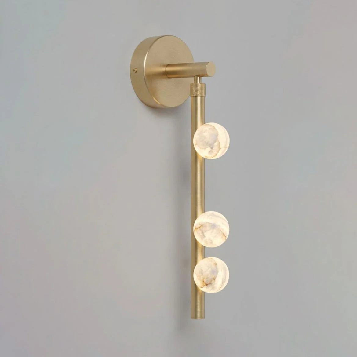 Alabaster Orb Asteria Brass Wall Sconce