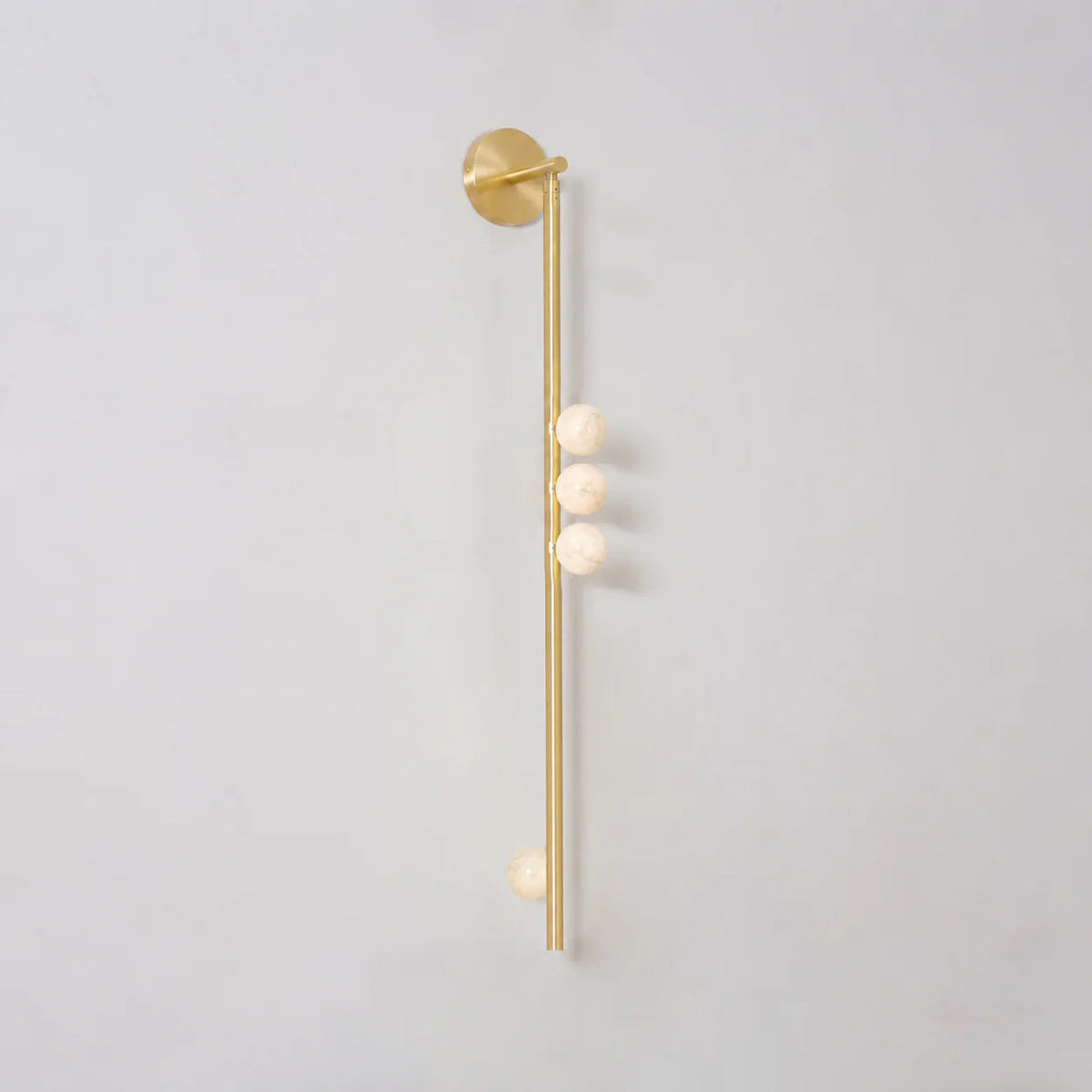 Alabaster Orb Asteria Brass Wall Sconce